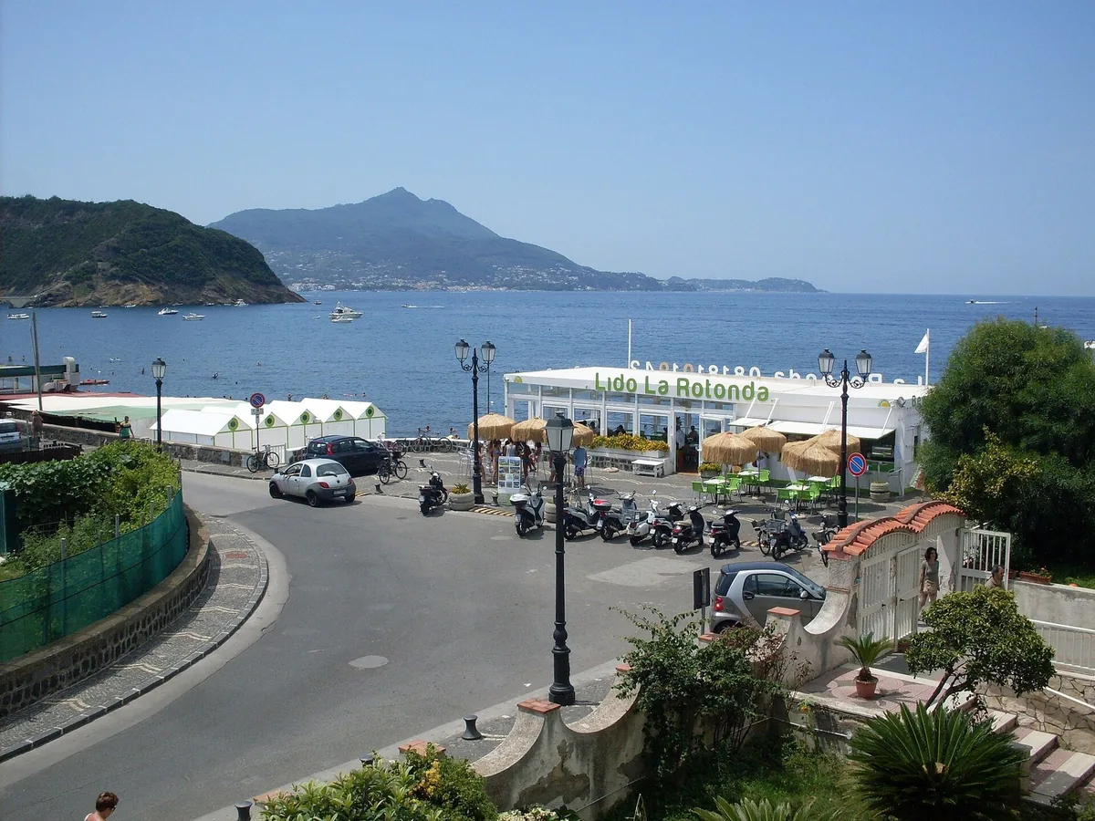 The boats in the harbour of the Chiaiolella with Vivara behind, Procida