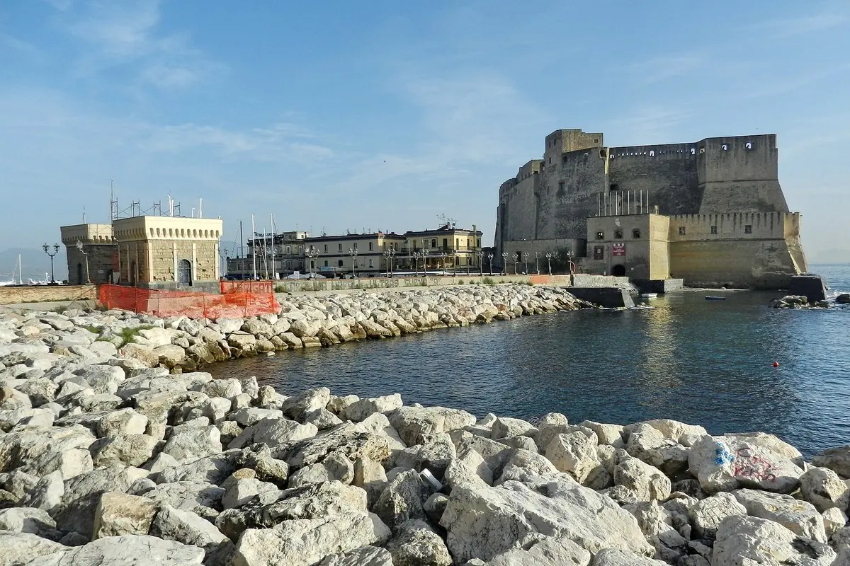 Castel dell&rsquo;Ovo and the Naples seafront, the starting point for Procida