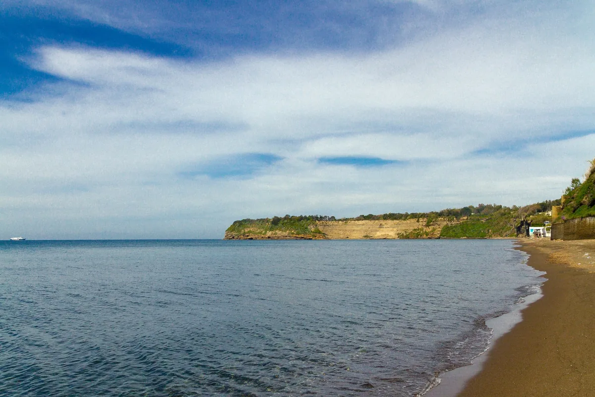 The Ciraccio sands with the tuff faraglioni